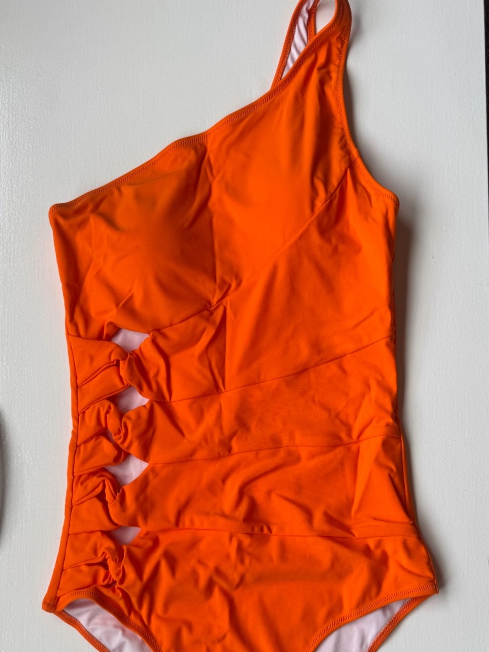 One one-piece swimsuit with cutouts, 3X
